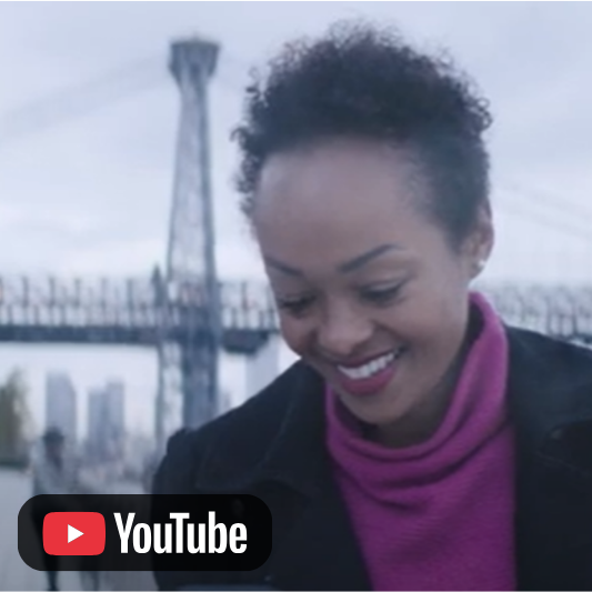 Video thumbnail featuring a person outdoors near a bridge, with a YouTube icon.