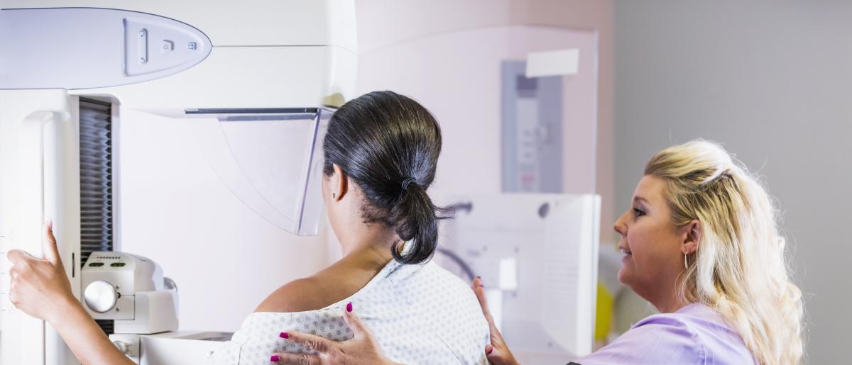 Woman receiving mammogram