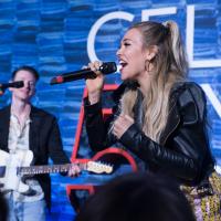 Singer performing live on stage